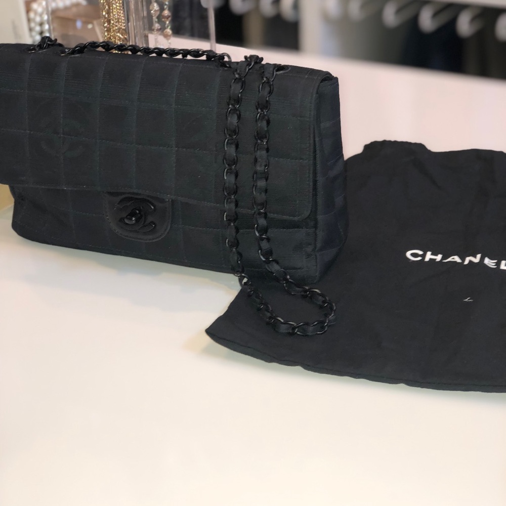 Chanel Flap travel line bag